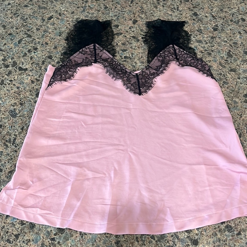 Maybe black lace tank size large never worn